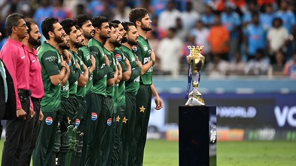 Pakistan's players stand for their national anthem
