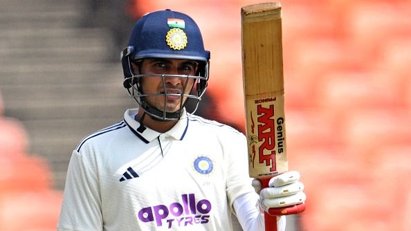 Shubman Gill celebrates after scoring a half-century (50 runs) during the second day of the first Test cricket match between India and West Indies at the Narendra Modi Stadium in Ahmedabad 