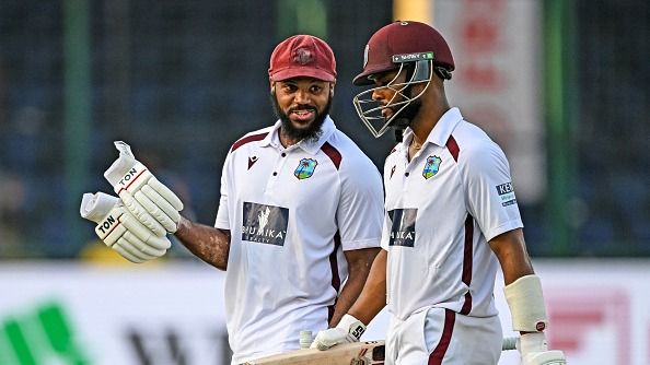 West Indies' John Campbell (L) and Shai Hope walk back to the pavilion