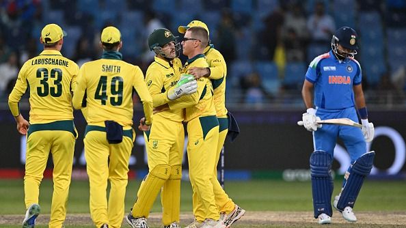 Australia's Adam Zampa (2R) celebrates with teammates