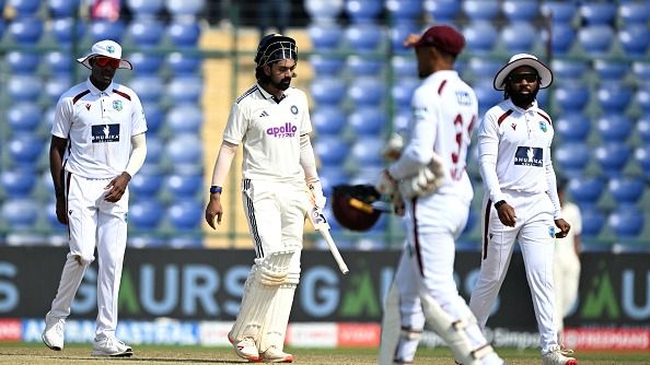 India's KL Rahul (2L) walks after their win against West Indies