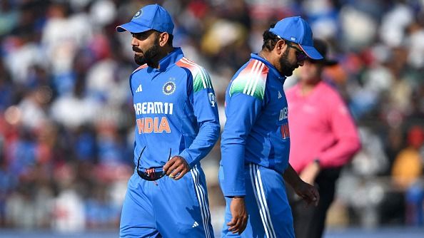 India's Rohit Sharma (R) and Virat Kohli in frame