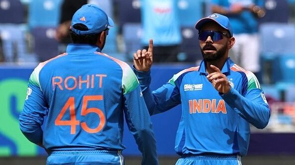 India's Virat Kohli (R) and Rohit Sharma