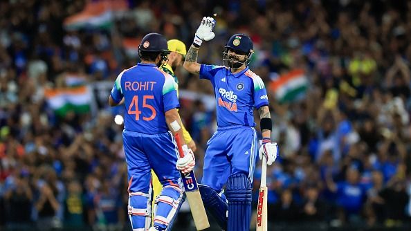 Rohit Sharma of India (L) celebrates with Virat Kohli