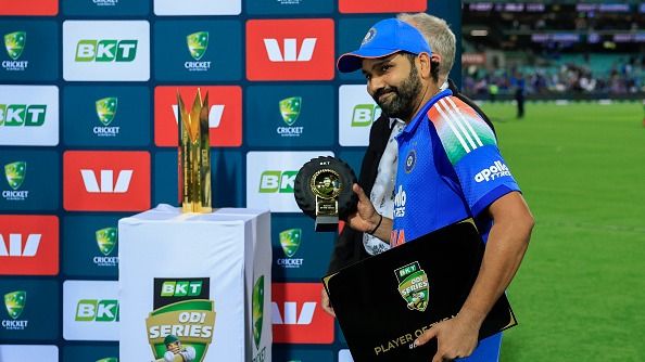 Rohit Sharma of India is presented with the player of the match award