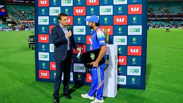 Rohit Sharma of India is presented with the player of the match award