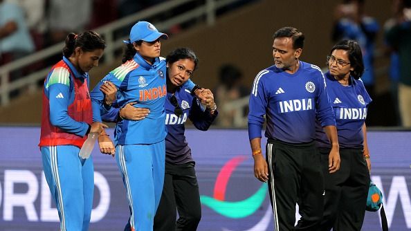 Pratika Rawal of India is helped off the pitch during the ICC Women's Cricket World Cup India 2025