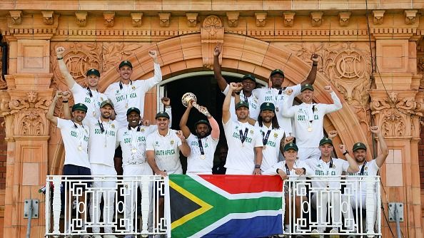 Temba Bavuma of South Africa celebrates on the team balcony with the ICC World Test Championship