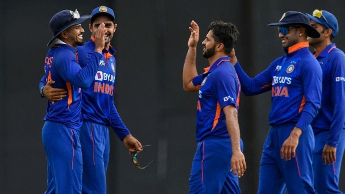 Shreyas Iyer (L), Shardul Thakur (2R) and Shikhar Dhawan (R) 