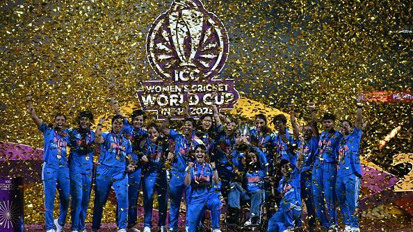 India's players celebrate with the trophy after winning the ICC Women's Cricket World Cup 2025