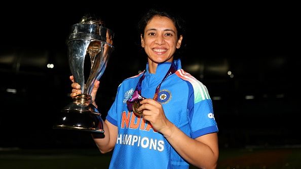 Smriti Mandhana of India poses with the ICC Women's Cricket World Cup trophy