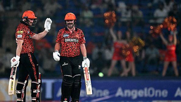 Sunrisers Hyderabad's Heinrich Klaasen (L) gestures next to his teammate Travis Head during the Indian Premier League (IPL) Twenty20 cricket match between Kolkata Knight Riders and Sunrisers Hyderabad