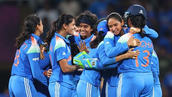 icha Ghosh of India is congratulated by team mate Harmanpreet Kaur after taking the catch to dismiss Marizanne Kapp of South Africa 