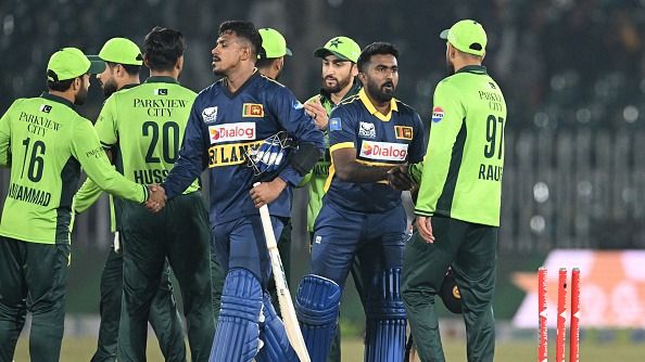 Sri Lanka's Maheesh Theekshana (CL) and Sri Lanka's Asitha Fernando (CR) shake hands Sri Lanka's Maheesh Theekshana (CL) and Sri Lanka's Asitha Fernando (CR) shake hands