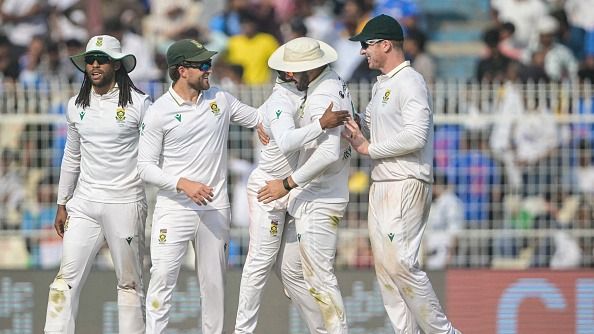 South Africa's captain Temba Bavuma (C) celebrates with teammates
