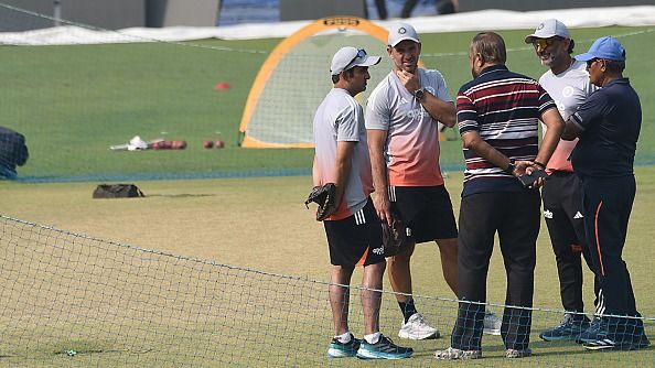Indian cricket team Head Coach Gautam Gambhir talks with Eden Gardens pitch curator Sujan Mukherjee