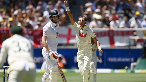 Mitchell Starc celebrates after dismissing Zak Crawley