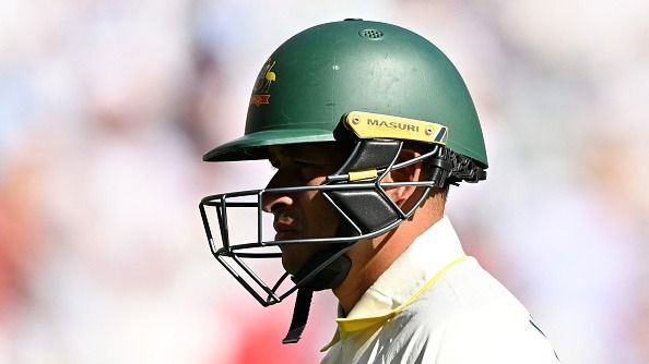 Australia's Usman Khawaja walks off the field