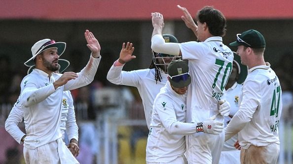 South Africa's Marco Jansen (2R) celebrates with teammates after taking the wicket of India's Kuldeep Yadav
