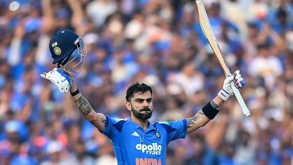 India's Virat Kohli celebrates after scoring a century