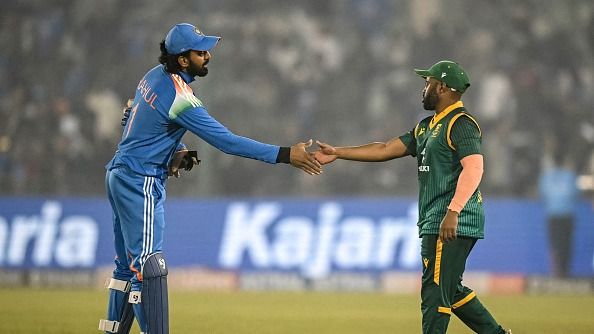 India's captain KL Rahul (L) shakes hands with his South African counterpart Temba Bavuma