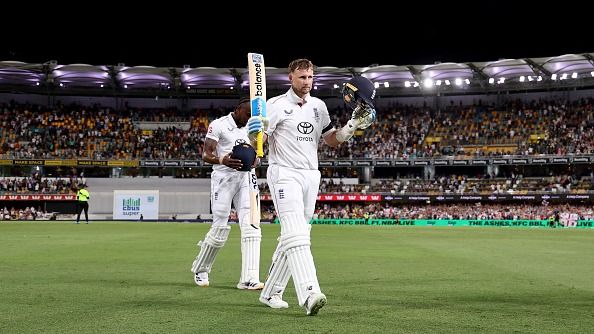 England's Joe Root walks off the ground at the end of day one of the second Ashes cricket Test match between Australia and England