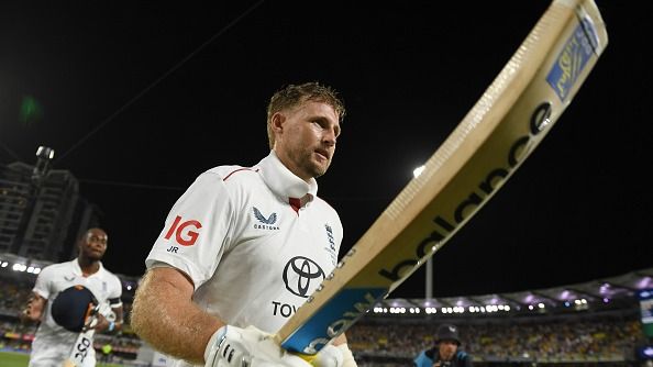 Joe Root of England leaves the field with Jofra Archer Joe Root of England leaves the field with Jofra Archer