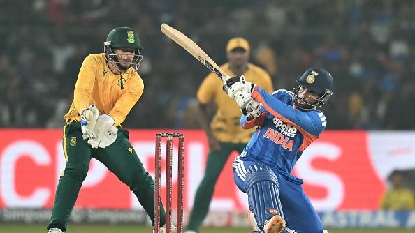 India's Tilak Varma (R) plays a shot India's Tilak Varma (R) plays a shot