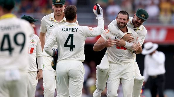 Australia's Michael Neser (2nd R) celebrates with team mates Australia's Michael Neser (2nd R) celebrates with team mates