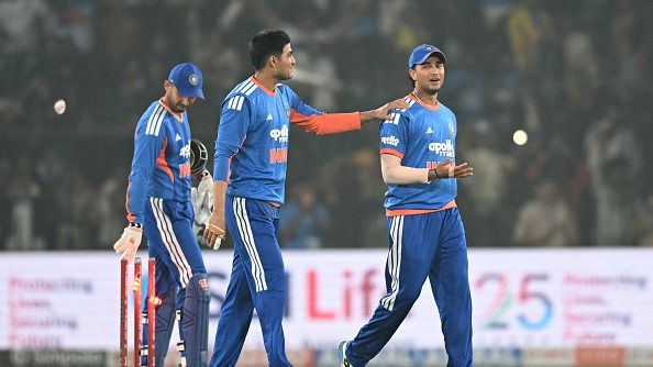 India's Shubman Gill (C) and Abhishek Sharma celebrate their team's win India's Shubman Gill (C) and Abhishek Sharma celebrate their team's win