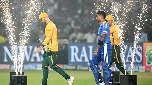 South Africa's captain Aiden Markram (L) enters the pitch alongside his Indian counterpart Suryakumar Yadav South Africa's captain Aiden Markram (L) enters the pitch alongside his Indian counterpart Suryakumar Yadav