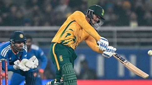 South Africa's Quinton de Kock (R) plays a shot South Africa's Quinton de Kock (R) plays a shot