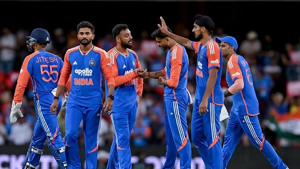 Varun Chakravarthy of India celebrates after taking a wicket Varun Chakravarthy of India celebrates after taking a wicket