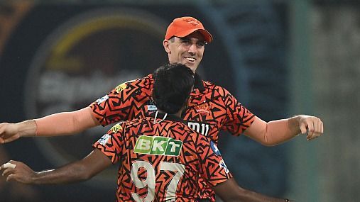 Eshan Malinga (L) of Sunrisers Hyderabad celebrates the wicket of Rishabh Pant of Lucknow Super Giants with teammate Pat Cummins Eshan Malinga (L) of Sunrisers Hyderabad celebrates the wicket of Rishabh Pant of Lucknow Super Giants with teammate Pat Cummins