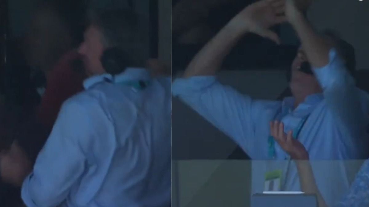 Glenn McGrath carrying a chair Glenn McGrath carrying a chair