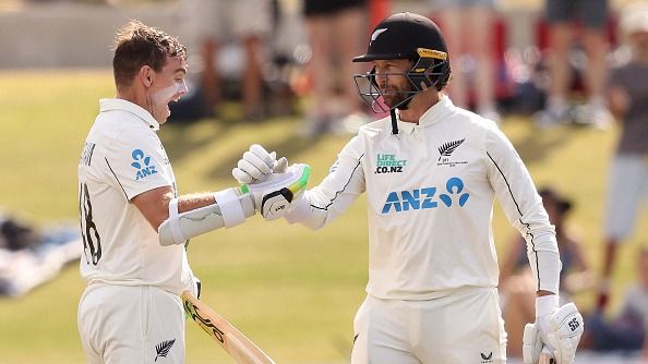 New Zealand's Tom Latham celebrates his century with Devon Conway 