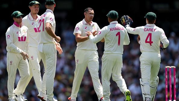 Scott Boland is congratulated by Usman Khawaja and Alex Carey Scott Boland is congratulated by Usman Khawaja and Alex Carey