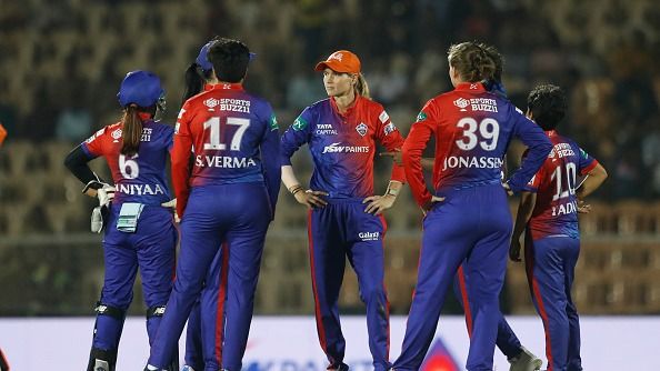 Meg Lanning of Delhi Capitals (centre) along with teammates wait for a DRS Meg Lanning of Delhi Capitals (centre) along with teammates wait for a DRS