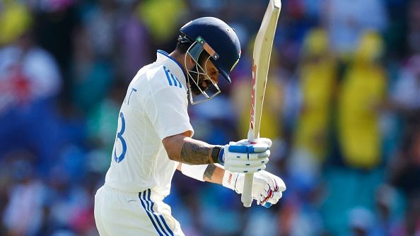 Virat Kohli of India looks dejected while leaving the field