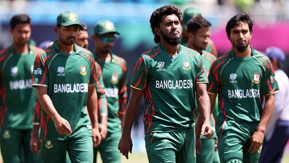 Players of Bangladesh cut dejected figures following the ICC Men's T20 Cricket World Cup