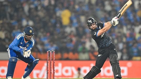 New Zealand's Glenn Phillips (R) plays a shot New Zealand's Glenn Phillips (R) plays a shot