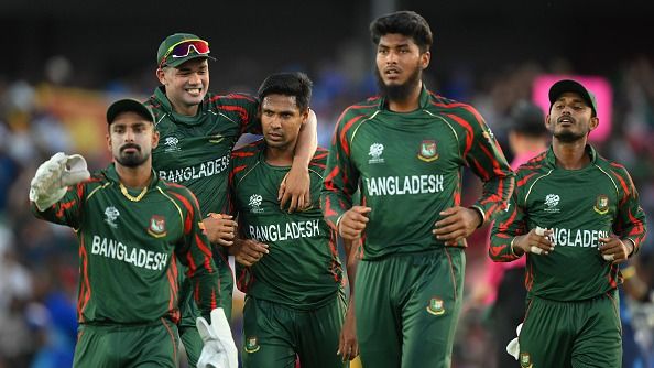 Mustafizur Rahman of Bangladesh celebrates with teammates after dismissing Pathum