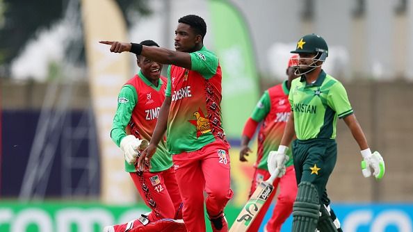 Panashe Mazai of Zimbabwe celebrates the wicket of Ali Hasan Baloch of Pakistan 