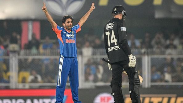 India's Ravi Bishnoi (L) celebrates after taking the wicket of New Zealand's Glenn Phillips India's Ravi Bishnoi (L) celebrates after taking the wicket of New Zealand's Glenn Phillips