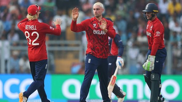 Will Jacks of England celebrates with Jacob Bethell after taking the wicket of Kushal Bhurtel