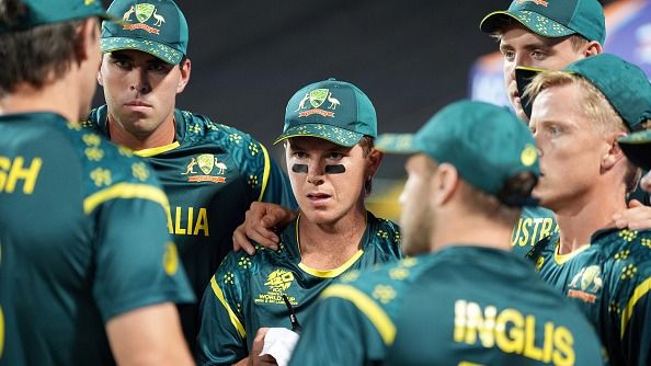 Adam Zampa of Australia looks on in the team huddle before they field during the ICC Men's T20 World Cup