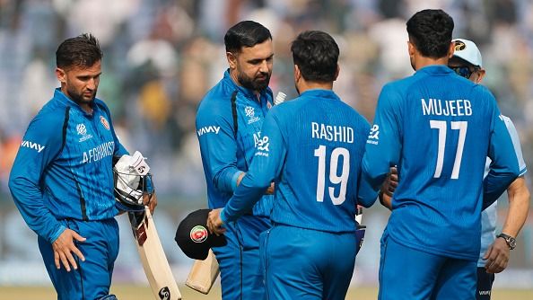 Mohammad Nabi, Azmatullah Omarzai and Rashid Khan of Afghanistan celebrate victory