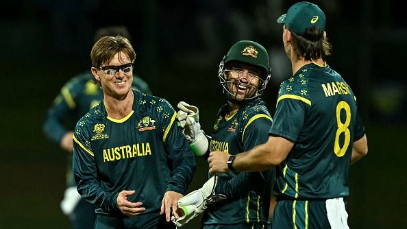 Australia's Adam Zampa (L) celebrates Australia's Adam Zampa (L) celebrates