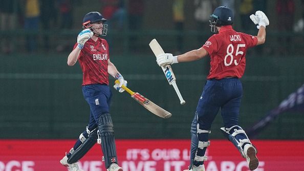 Harry Brook of England celebrates their century with team mate Will Jacks