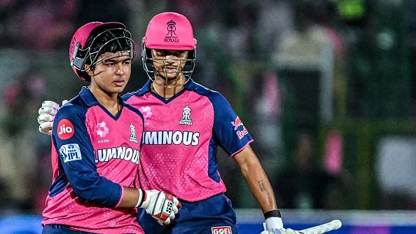 Rajasthan Royals' Vaibhav Suryavanshi (L) is being greeted by his teammate Yashasvi Jaiswal